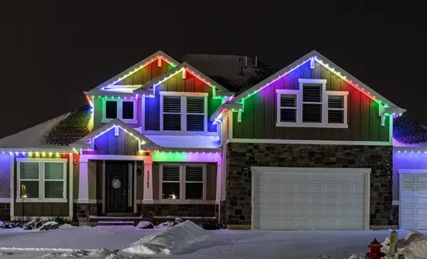 House with permanent lights: Christmas, after the first snow